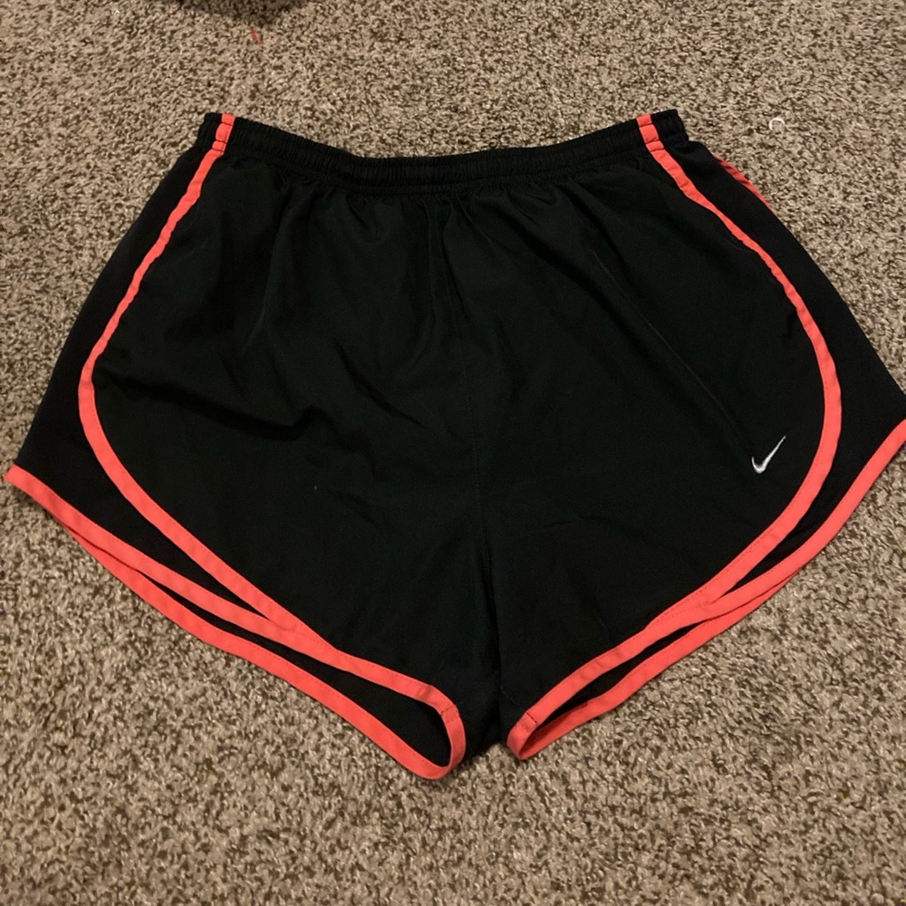 Black Nike running shorts with pink highlights